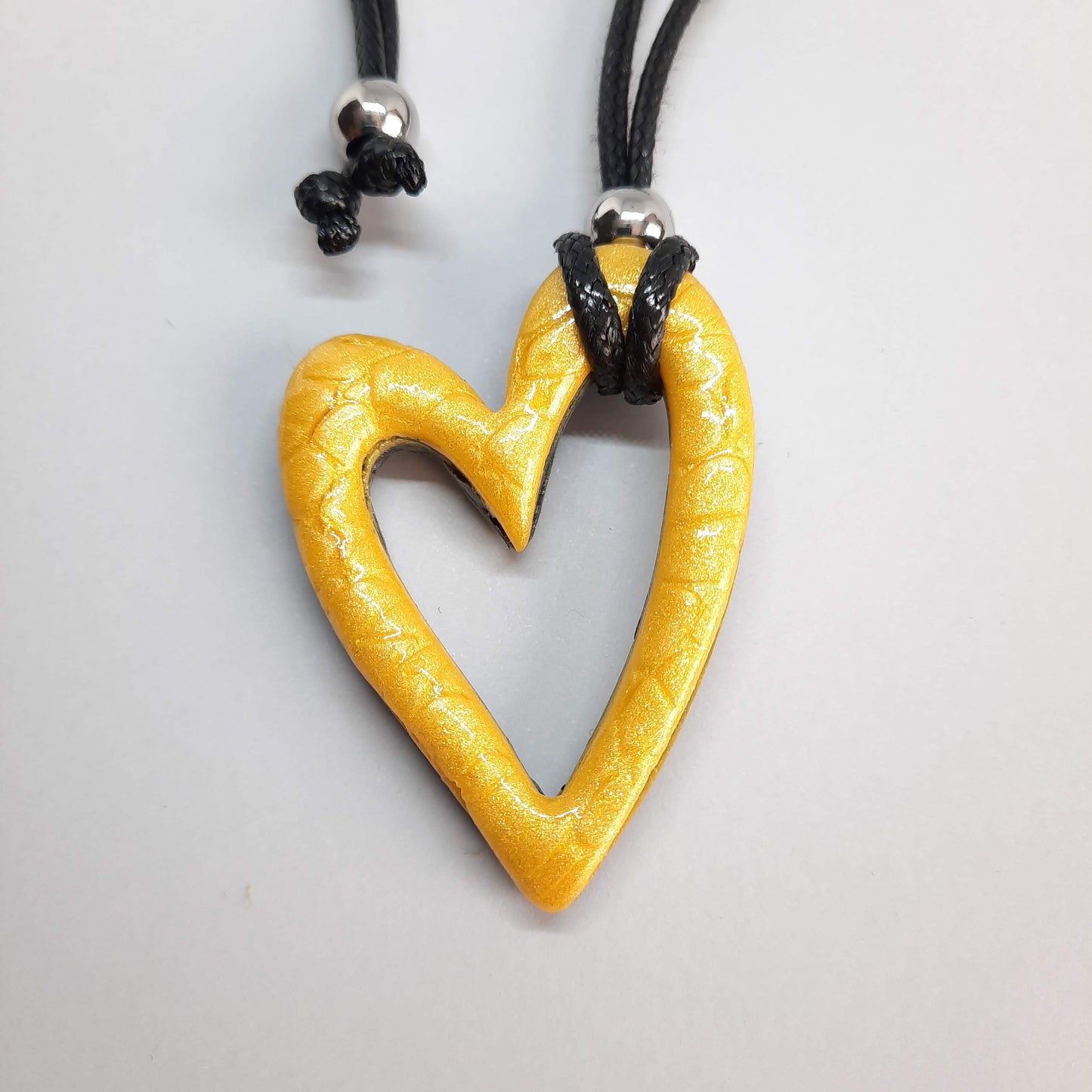 Colgante Corazón Hueco Mediano Amarillo