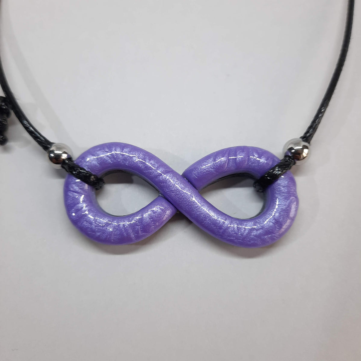 Colgante Infinito Lila