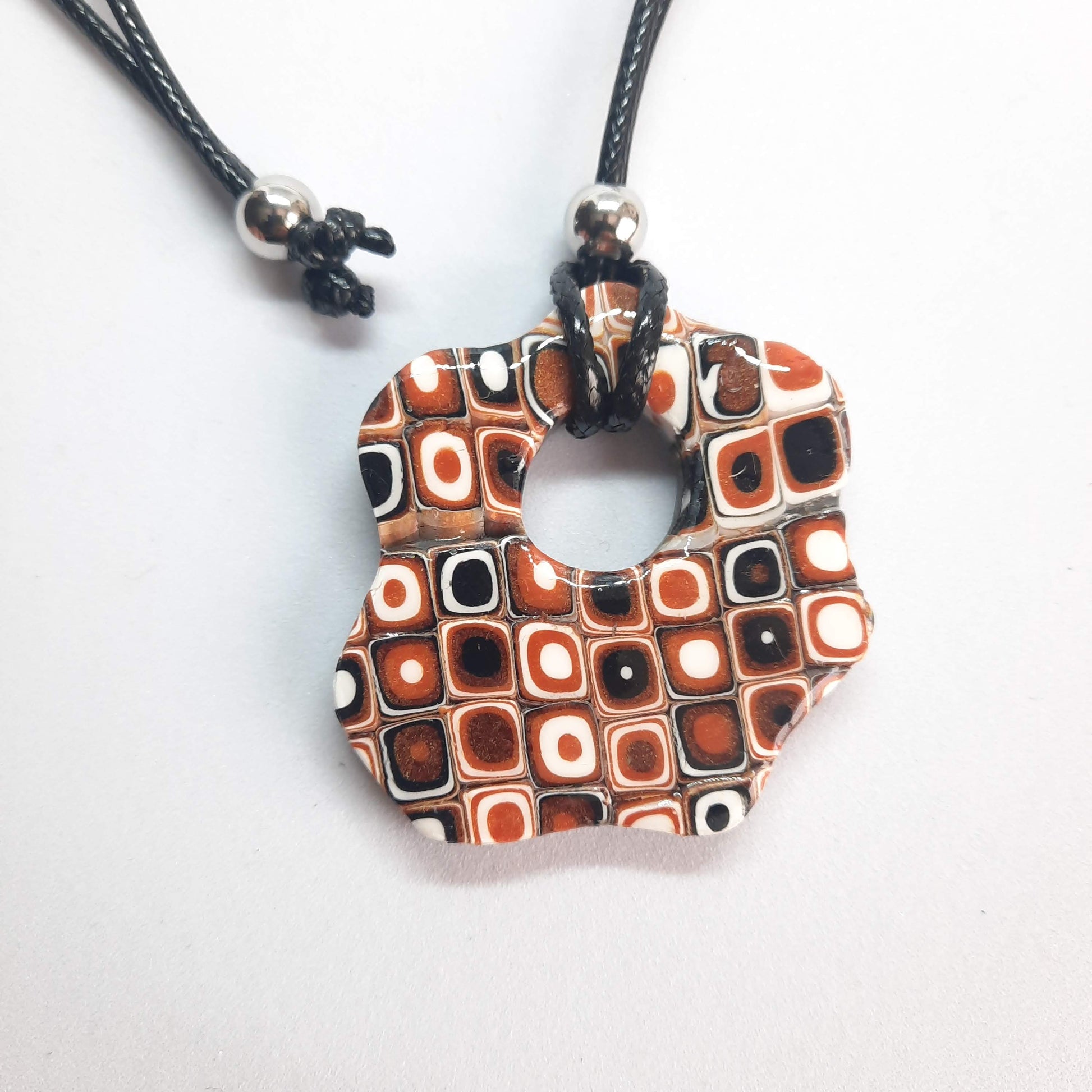 Colgante Fantasy Naranja Blanco Negro