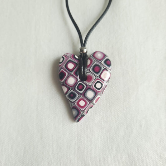 colgante corazon rosa blanco