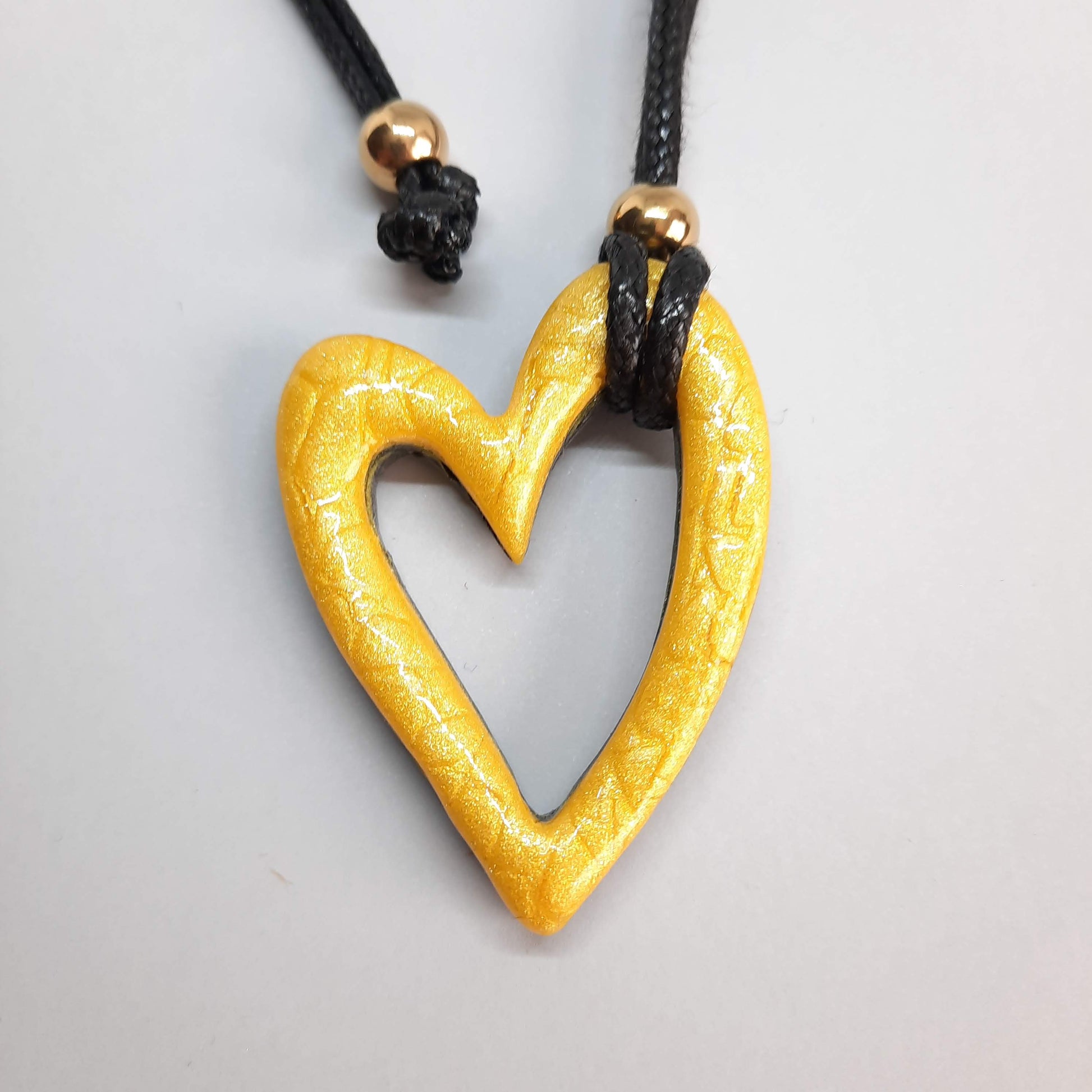 Colgante Corazón Hueco Mediano Amarillo