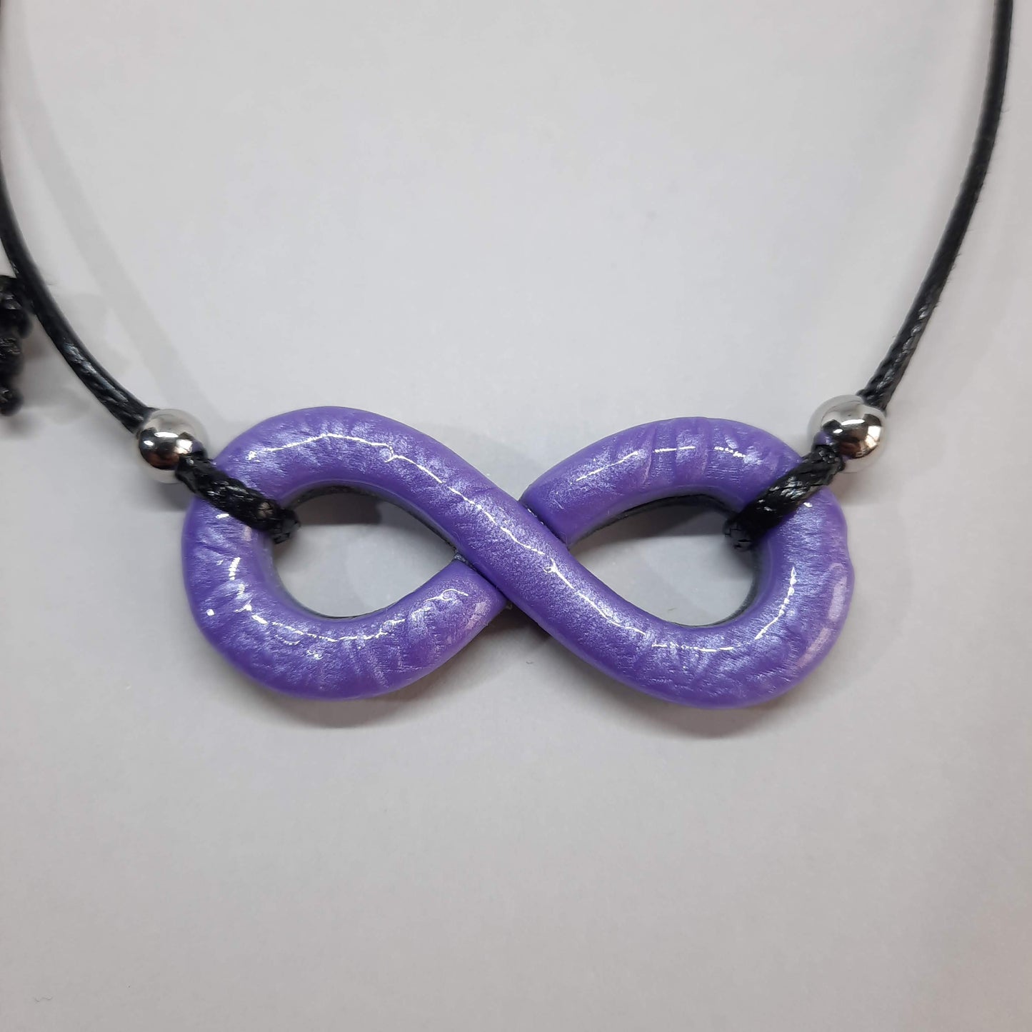 Colgante Infinito Lila