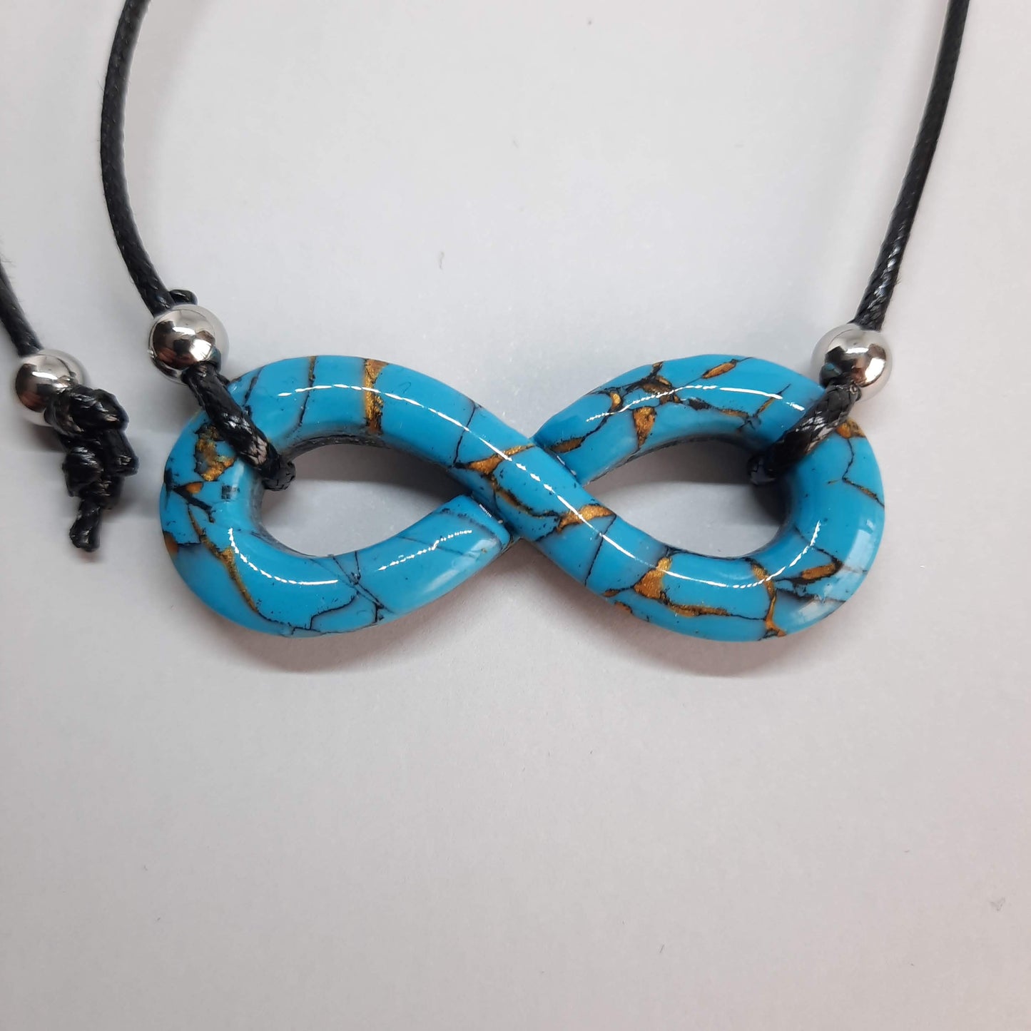Colgante Infinito Turquesa