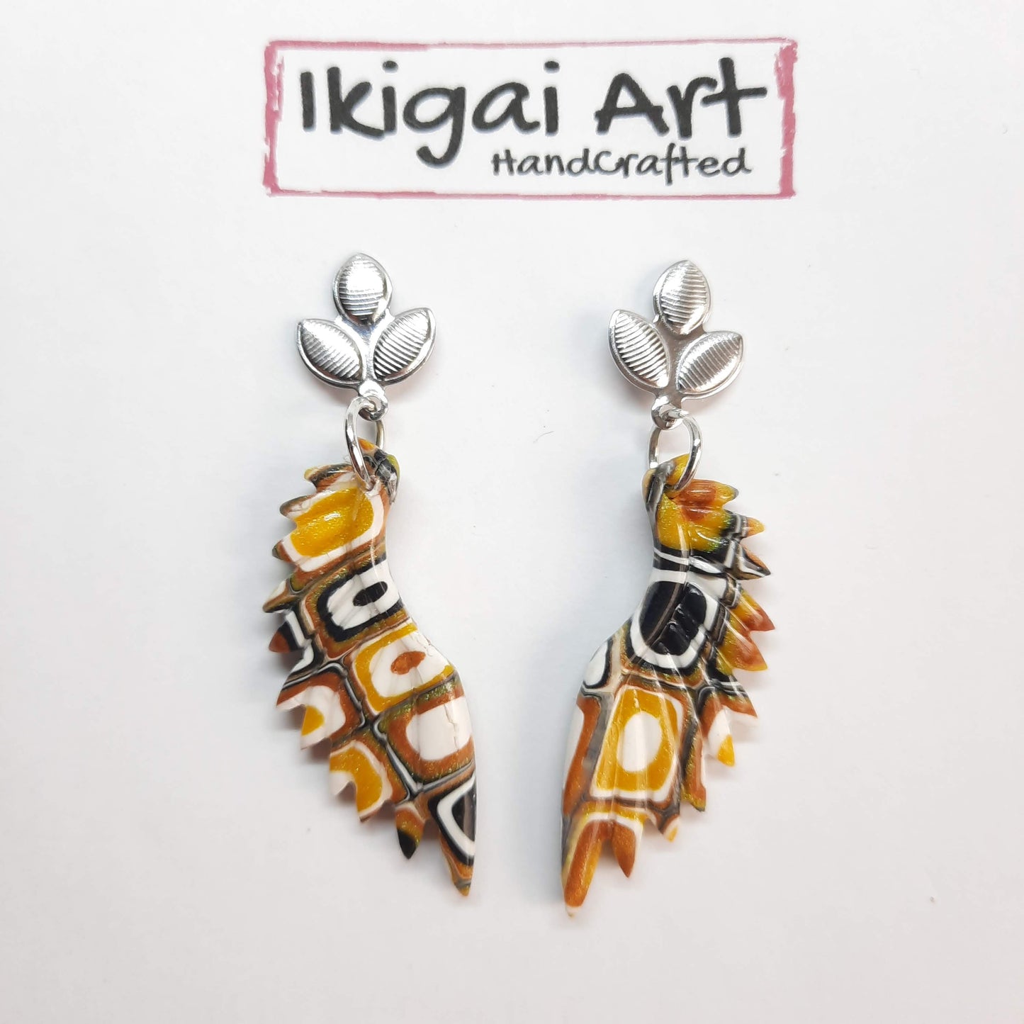 Pendientes Alas Amarillo Antiguo con Base Plateada